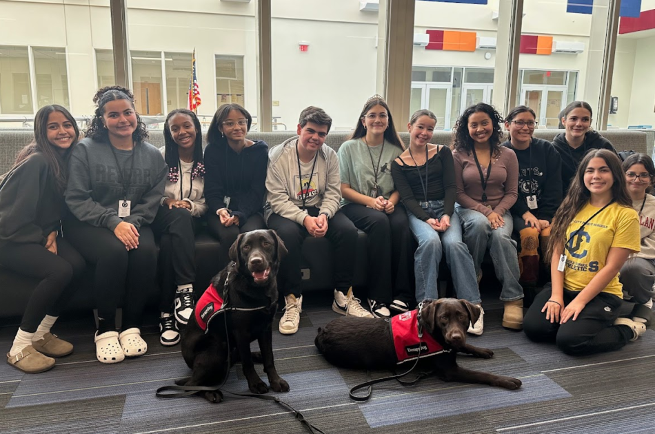 Promoting Wellness and Peace: Therapy Dogs Visit HTHS/ACTE